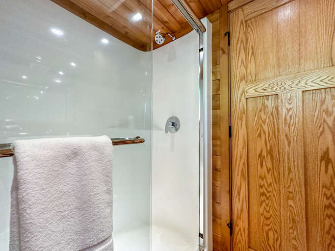 The bathroom has a walk-in shower that is also accessible.