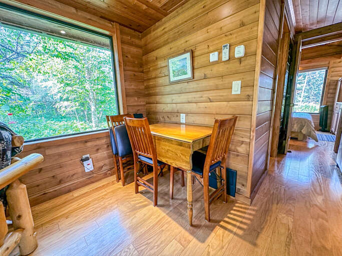 There is a small eating area near the living room.