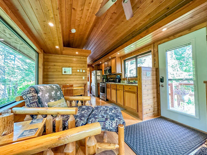 Step into the tiny home through the front door.