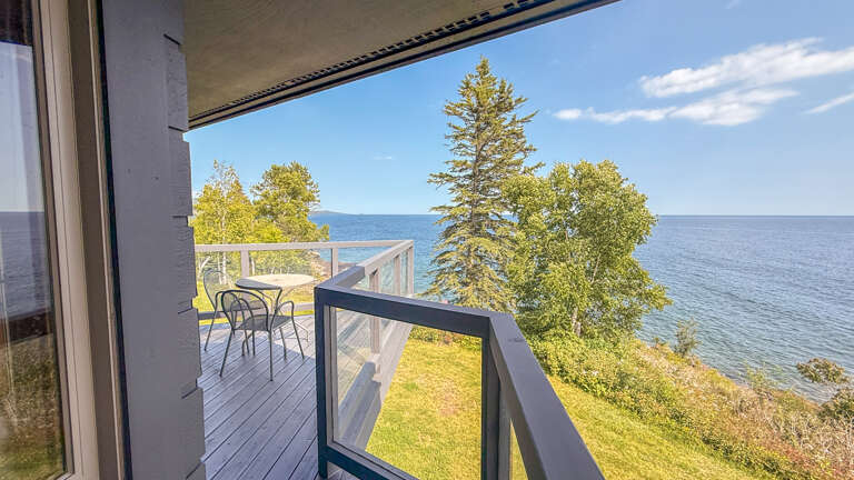 There is a deck off of the living room. There is a deck off of the living room.