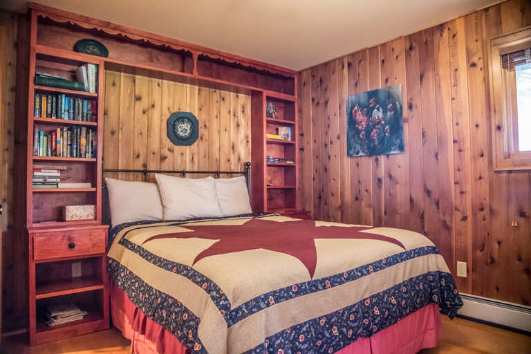 The guest bedroom also offers a queen bed.