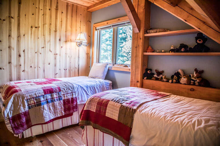 The guest bedroom features 2 twin beds. The guest bedroom features 2 twin beds.
