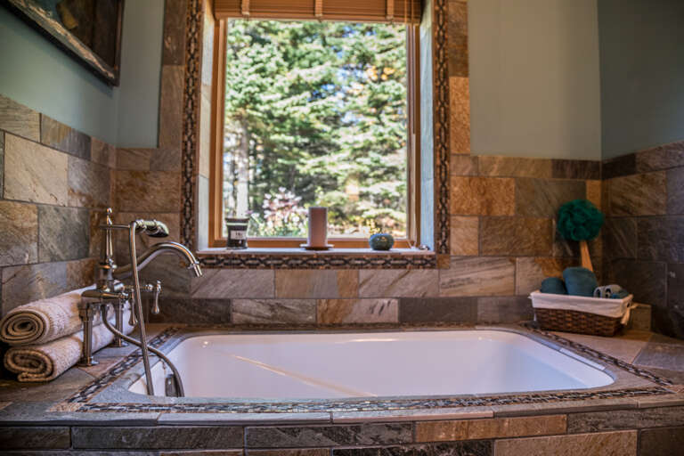 Cap off the day with a relaxing soak in the soaker tub. Cap off the day with a relaxing soak in the soaker tub.