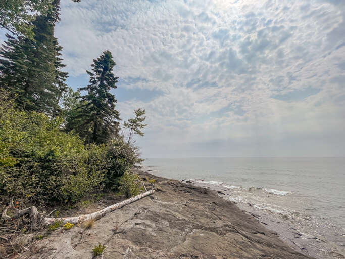 Take a stroll along the 300 feet of ledgerock shoreline.