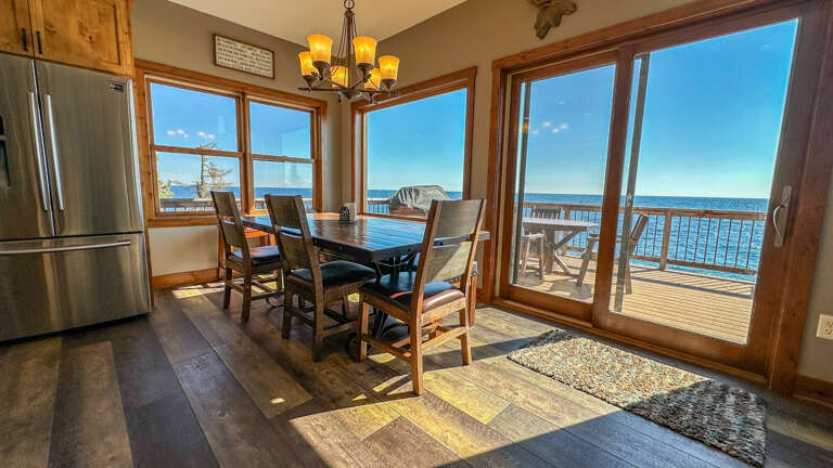 The large dining room table can sit up to 10 guests, with additional seating at the kitchen bar, so all members of your party can dine at the same time.