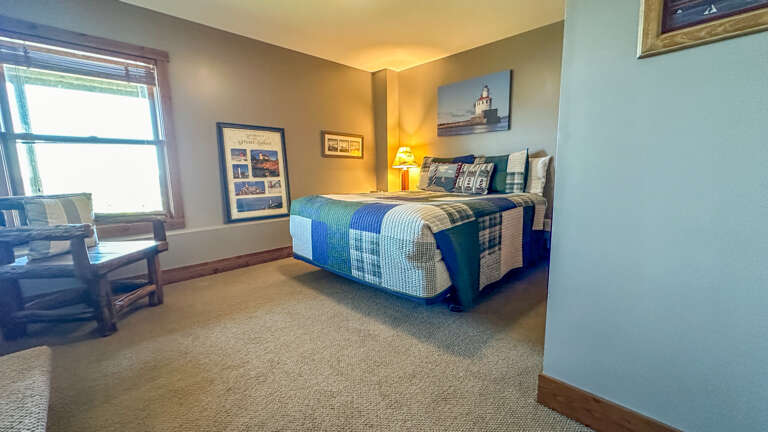Located on the lower level, Bedroom 4 has a queen bed.