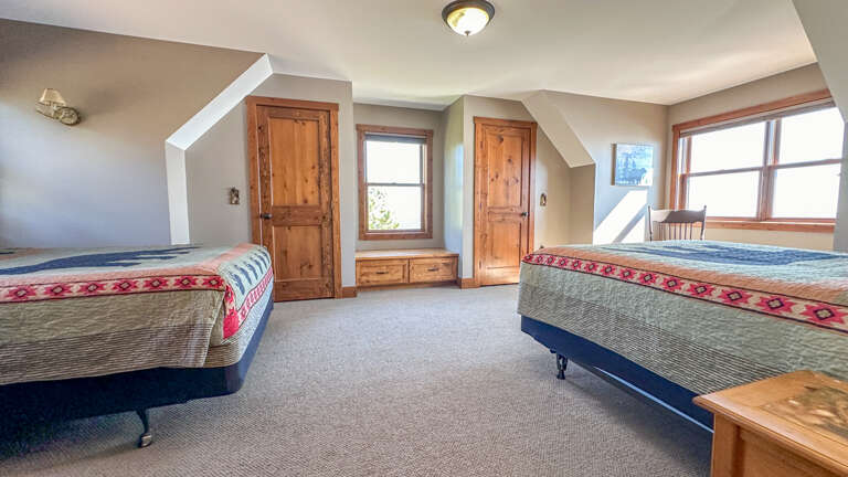 Bedroom 3 has two queen beds.
