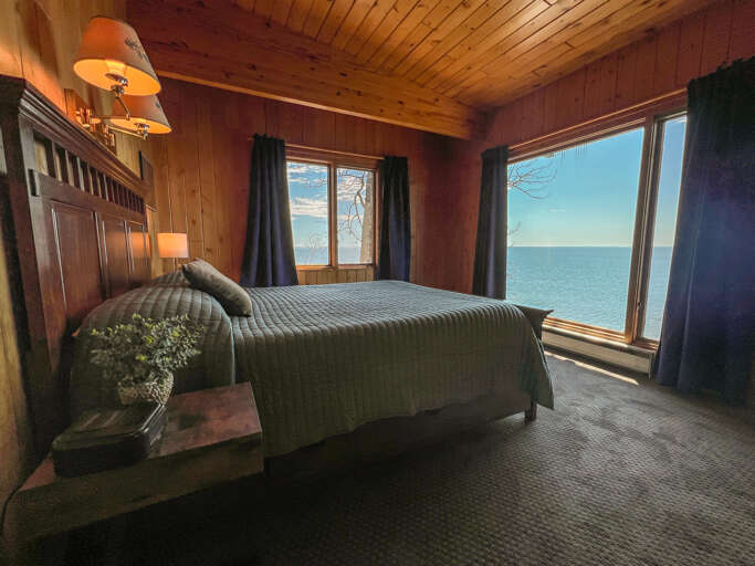 This bedroom is located on the upper level