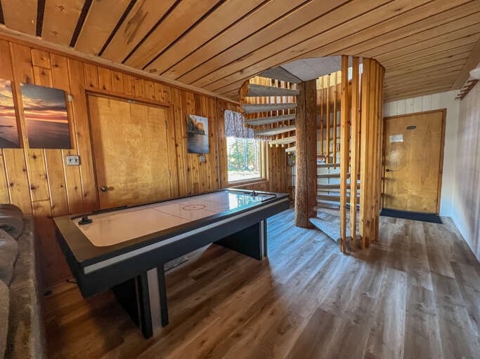 Enjoy the air hockey table located in the lower level family room.