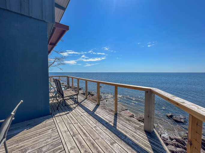 Spring House features a lake facing deck with endless Lake Superior views.