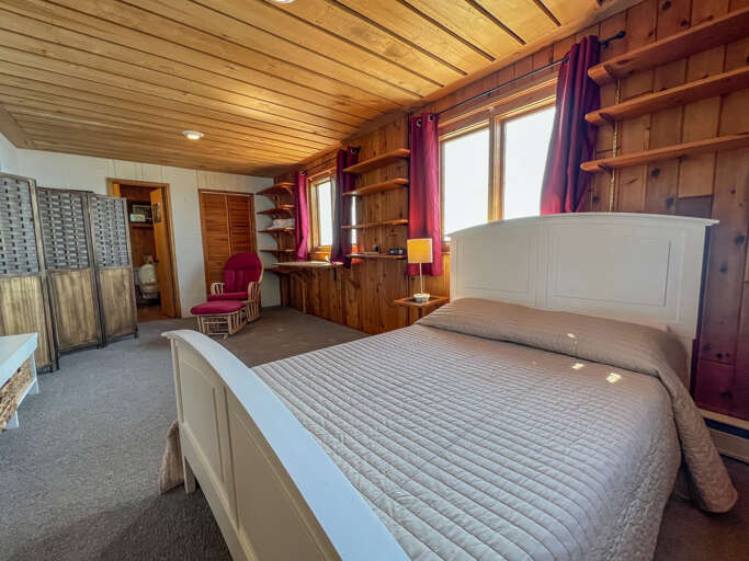The lower level bedroom features a full sized bed.