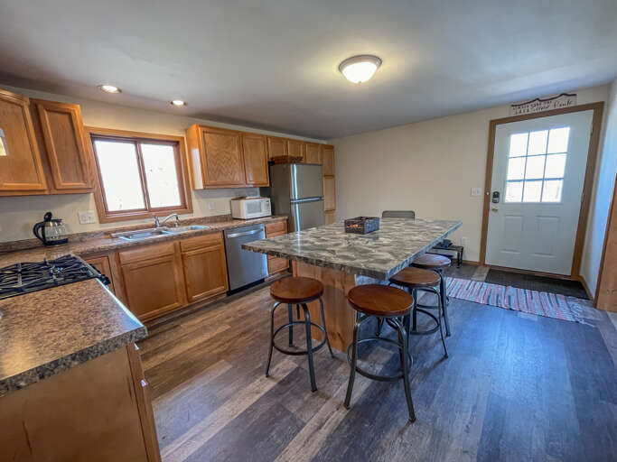 Enjoy a meal on the spacious island.