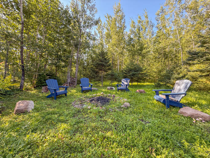 Light a fire in the massive fire ring.