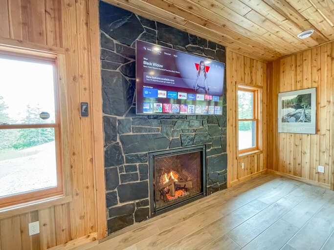 Curl up in front of the gas fireplace that appears to burn real embers!