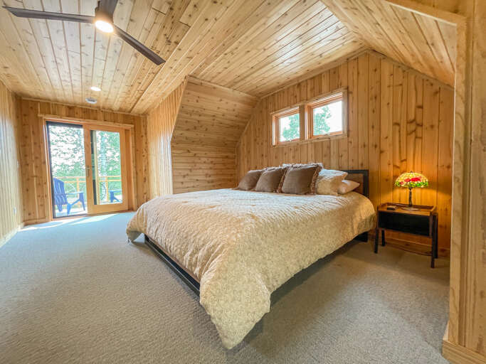 The master bedroom is located on the upper level of the home.