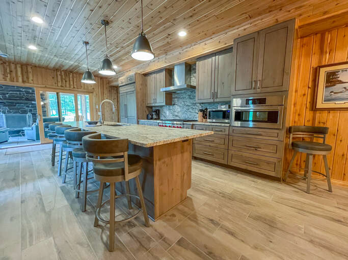 The open kitchen allows you to socialize with the family while cooking.