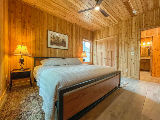 This bedroom also features a large king bed