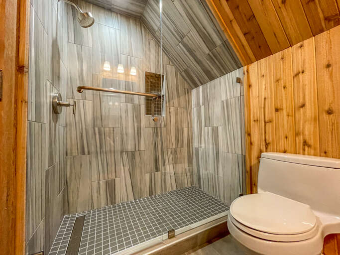 This bathroom is locate don the upper level