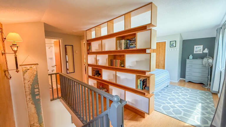 Head upstairs to find two bedrooms and a bathroom.