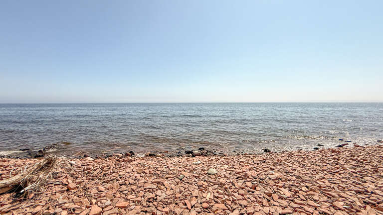 Watch the sun rise and set from you own section of Lake Superior.