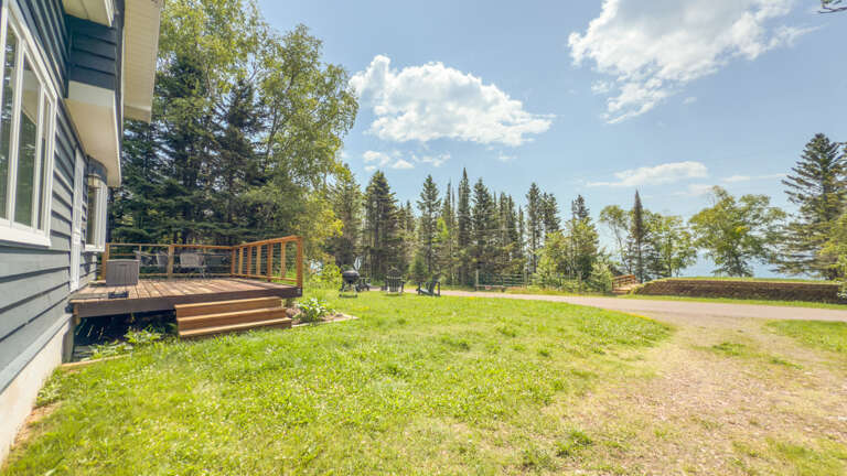 The fire pit and spacious yard make this home perfect for families.