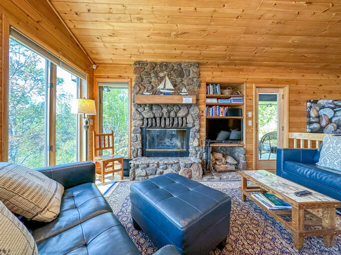 Enjoy the stone-surround gas fireplace in the main level living room.