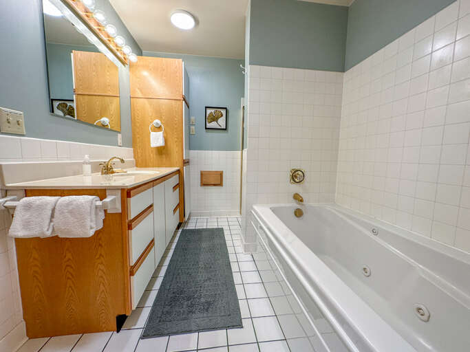 This bathroom is located off of Bedroom 1.