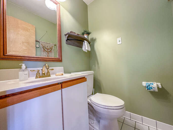 Half bath located off of the living room.