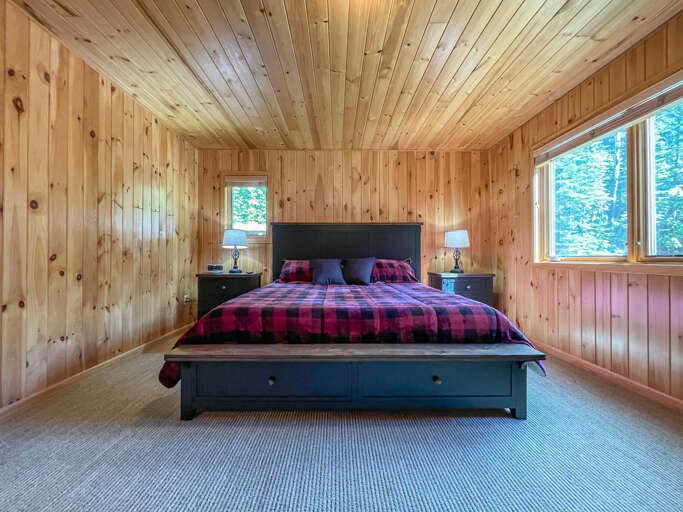 This bedroom is located on the main level of the home