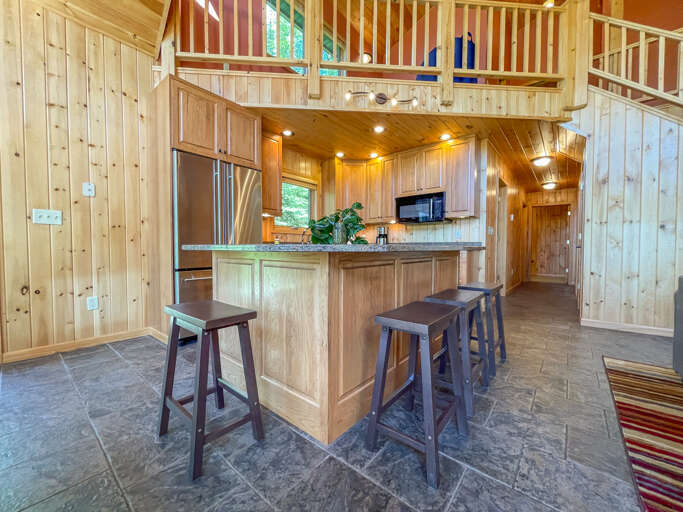 The kitchen counter also offers additional seating.