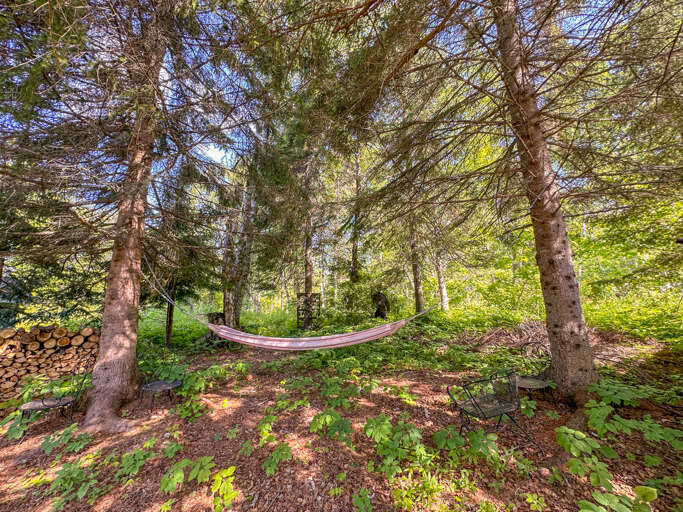 Relax in the hammock in the back yard while you listen to the waves in the distance.