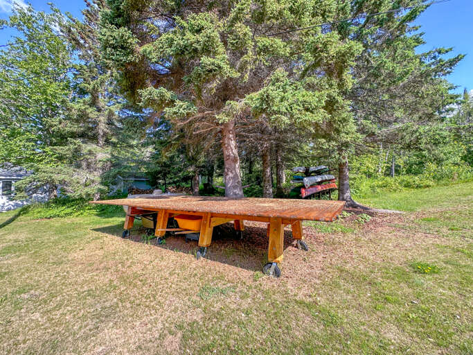 Enjoy games at the large table in the backyard.