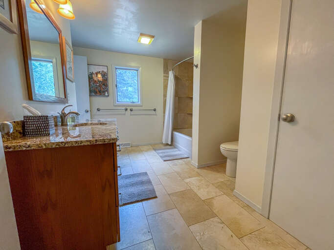 Attached to the Bedroom 2 is a bathroom you can also access from the hallway.