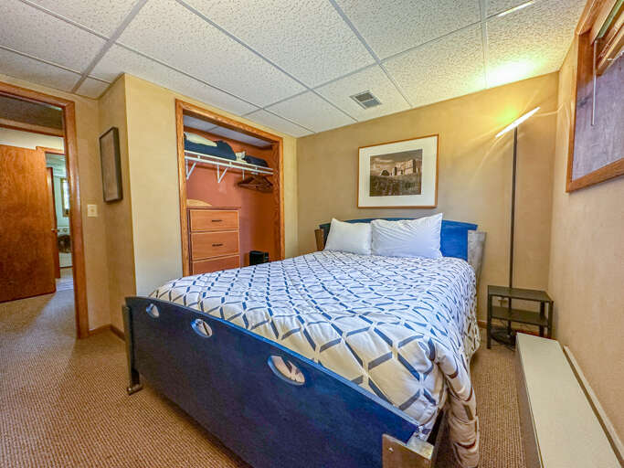 Bedroom 3 has a queen sized bed.
