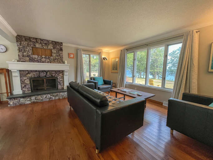 Relax on the couch and enjoy a book or watch the many moods of Lake Superior