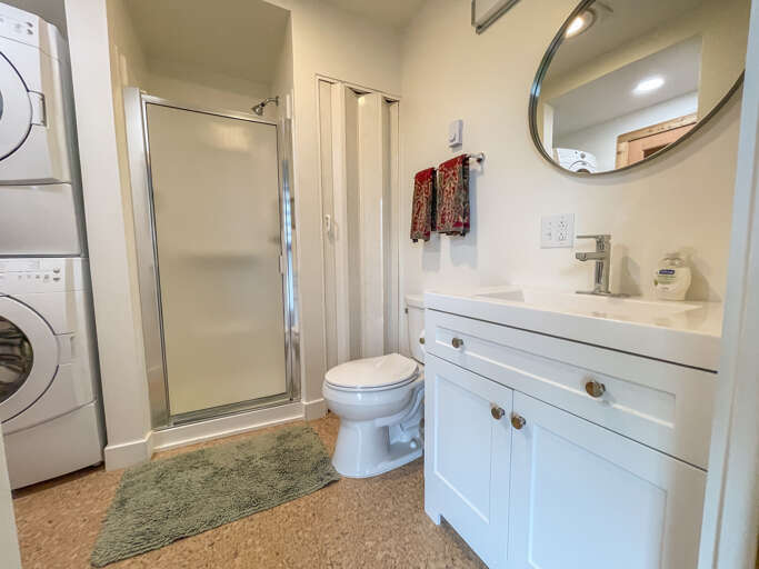 Bathroom one is located on the main level of the home