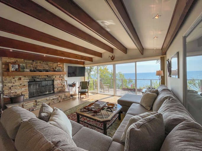 Inside the home, you will find a spacious living area on the main level.