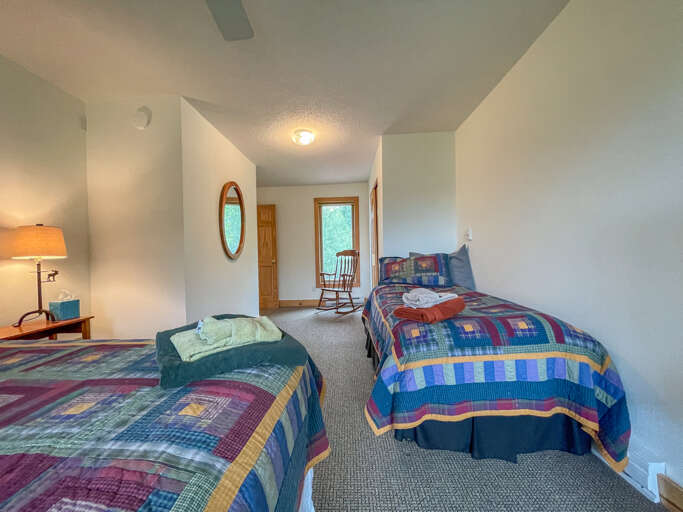 offers a king bed and a twin bed.