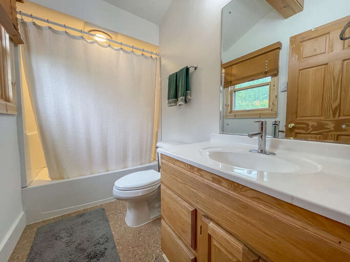 Bathroom two is located on the upper level and it features a shower/tub combo