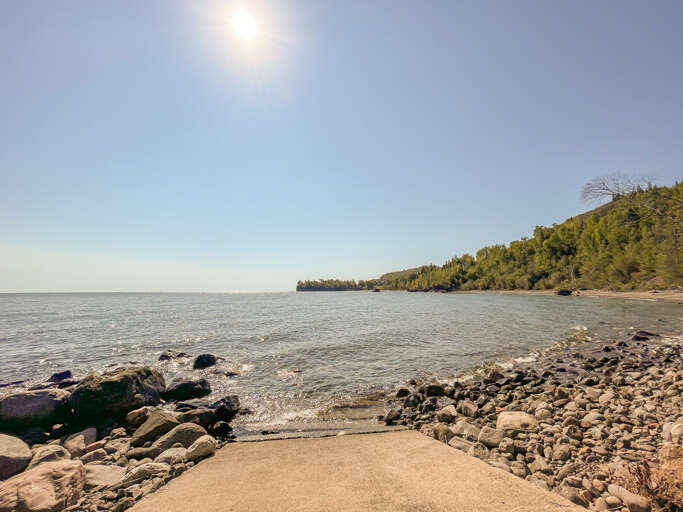 Dip your toes into Lake Superior.