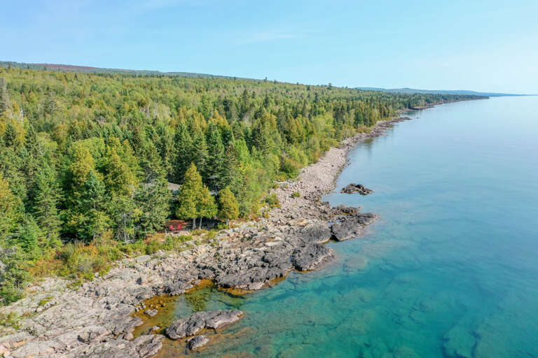 Notre Reve is nestled nicely amongst the trees, creating a privacy barrier even from Lake Superior!