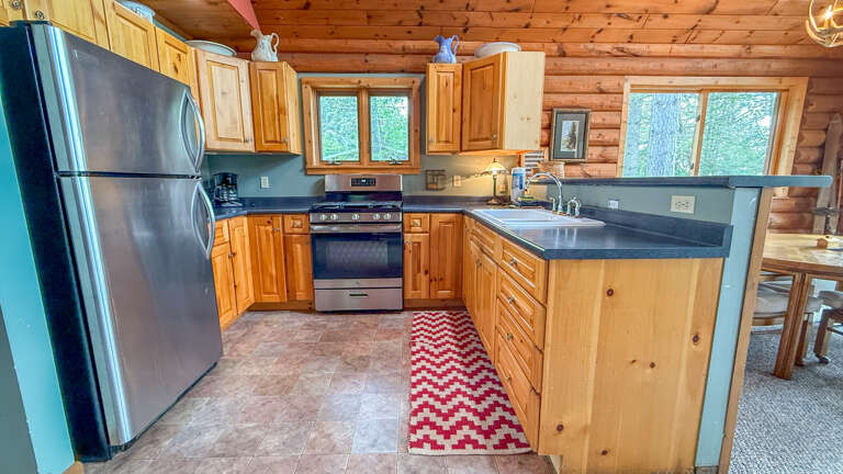 Kitchen with stainless steel appliances. Kitchen with stainless steel appliances.