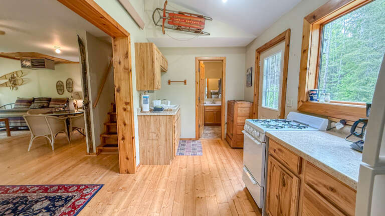 Kitchen looking into the bathroom.