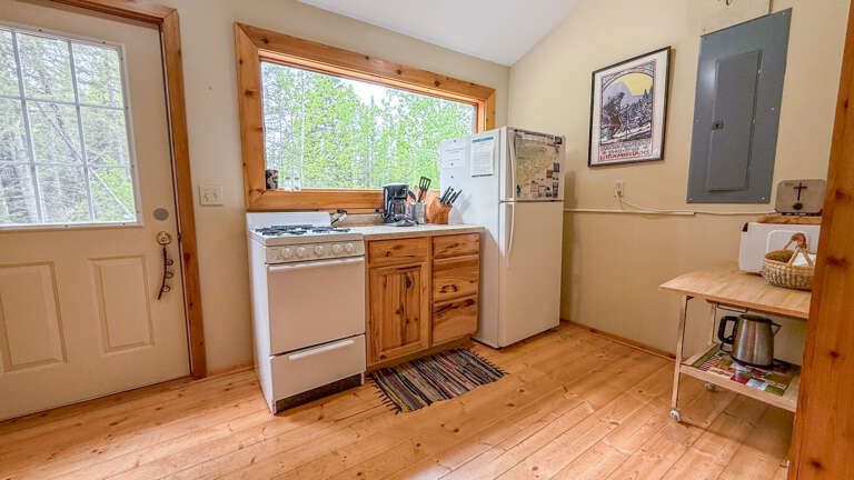 The quaint kitchen may not be filled with every amenity, but it has what you will need to enjoy a meal of freshly caught Pike Lake fish!