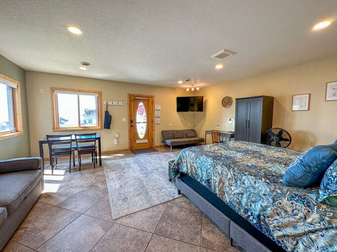 You enter into this three-room studio from the lakeside door.