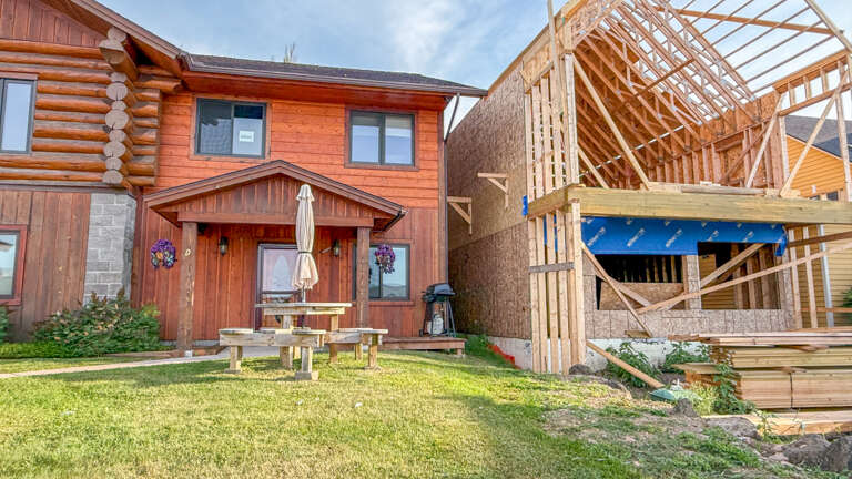 A new home is being built next door to Harbor Hideaway, construction will continue through 2025.