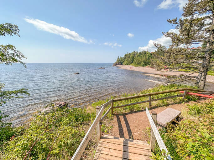 Take a break at the bottom of the stairs overlooking the Poplar River. Take a break at the bottom of the stairs overlooking the Poplar River.
