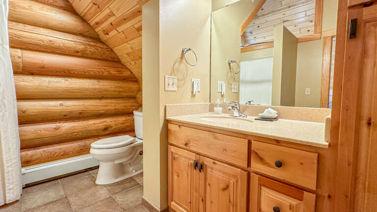 Bathroom 2 is located on the upper level.