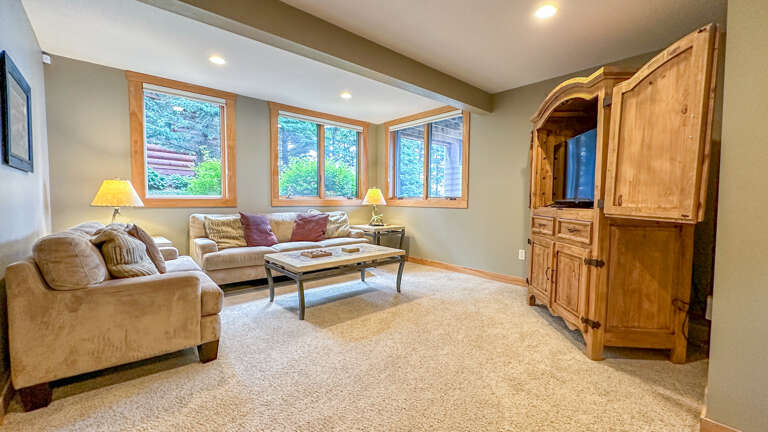 Downstairs there is a lower level family room.