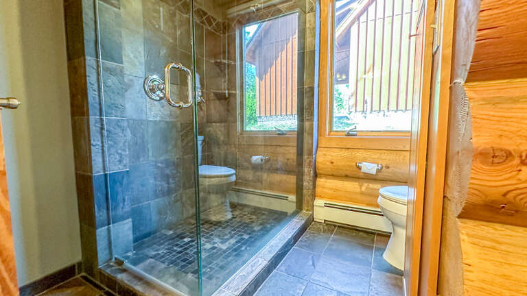 Bathroom 1 is attached to both Bedroom 1 and the entryway hallway.